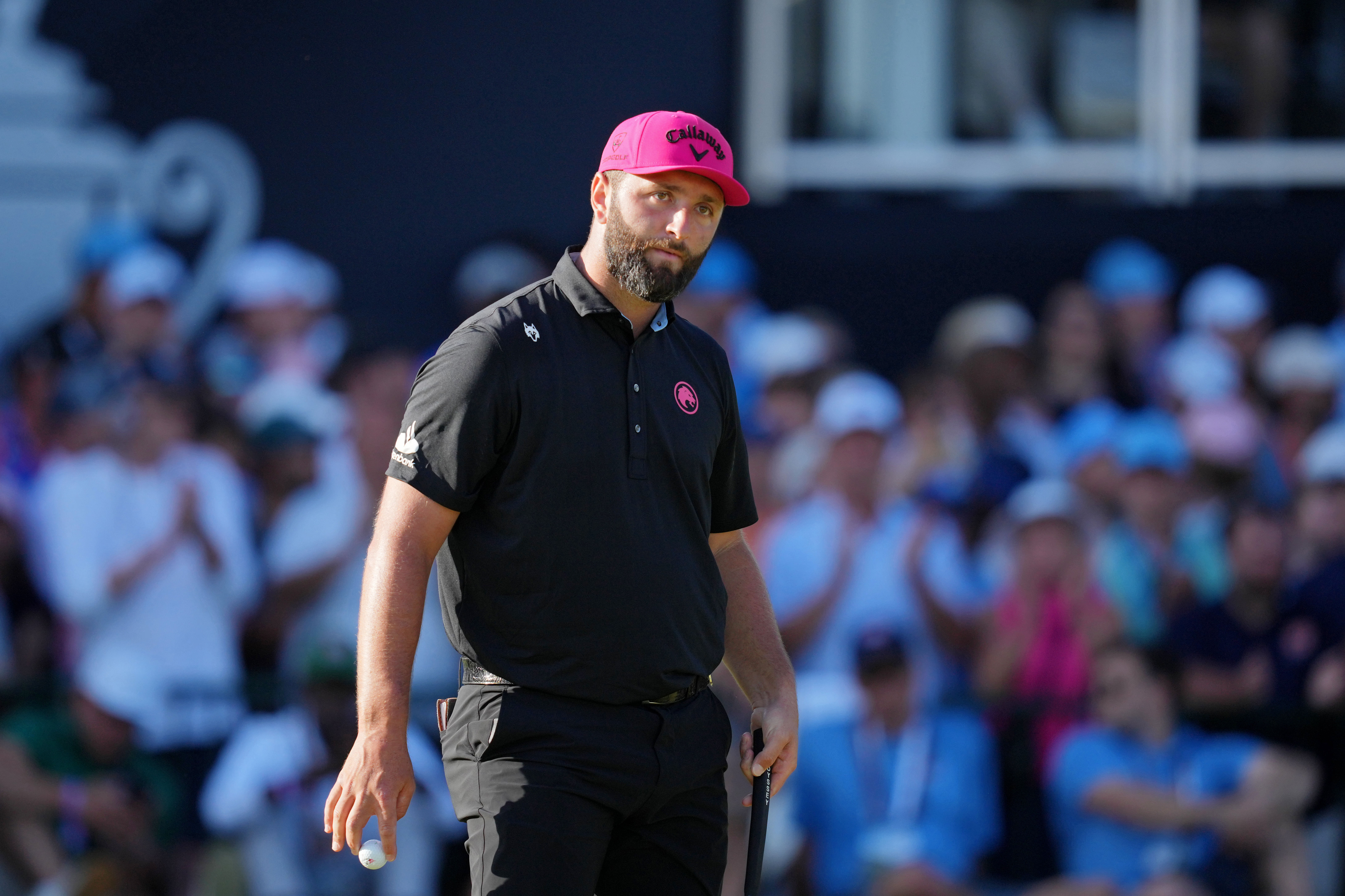 Jon Rahm looks on from the 18th green during the final round of the PGA Championship - Source: Imagn